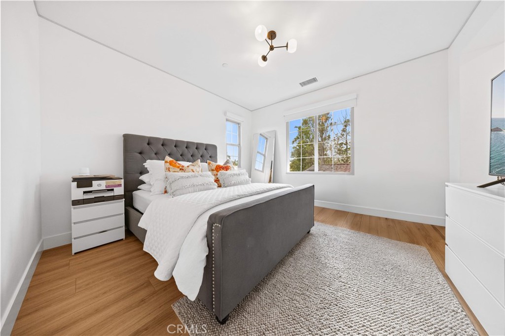 89 Kestrel Irvine, CA 92618 - Photo 26 of 45 a bed room with a bed and a window