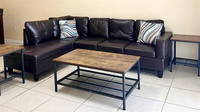 a living room with a couch and a coffee table