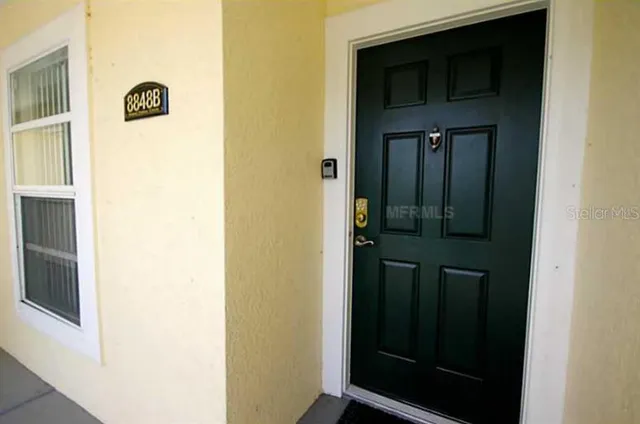 a view of elevator with hallway