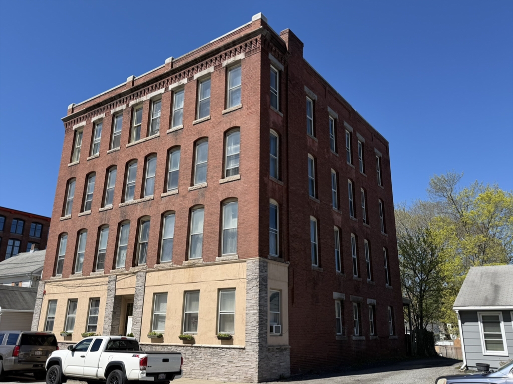 112 School Street Clinton, MA 01510 - Photo 3 of 20 a front view of a building
