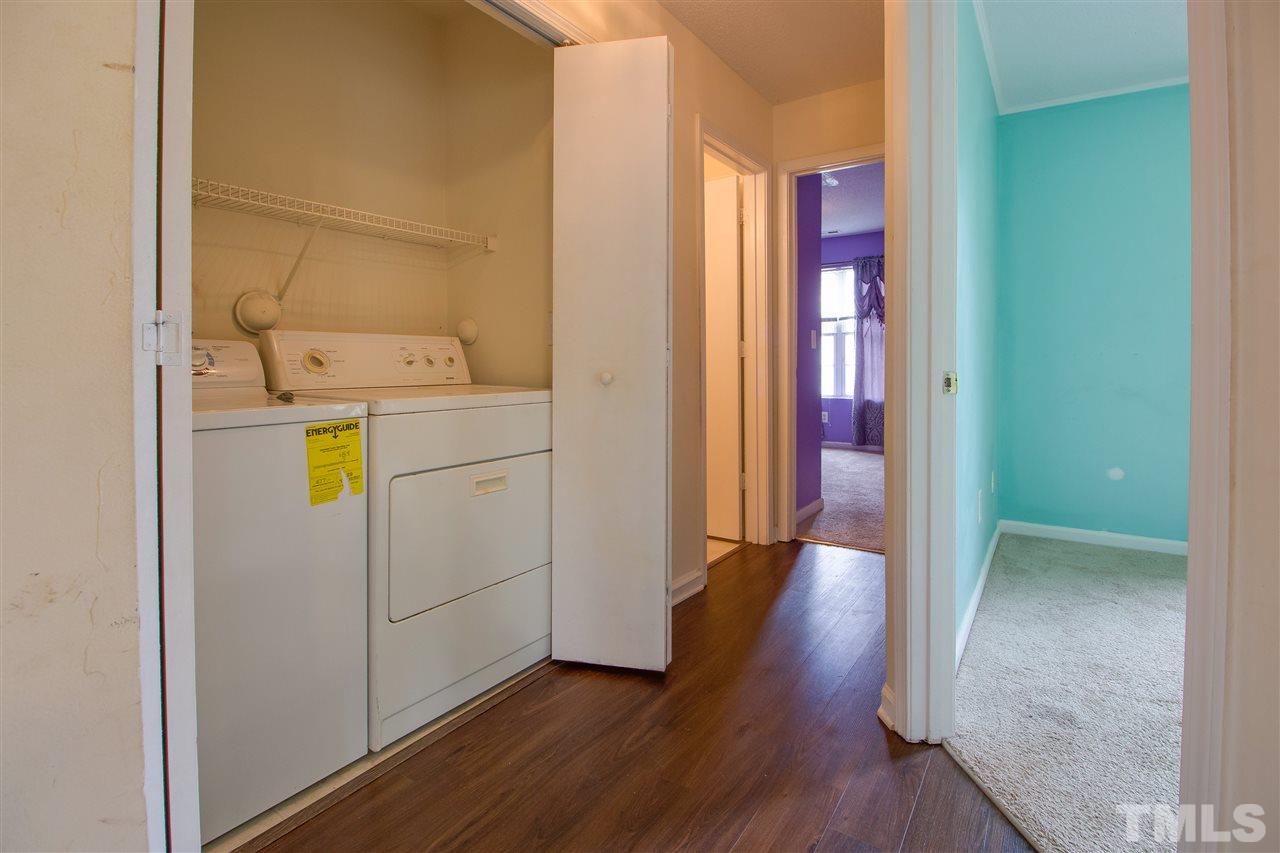 2905 Oneida Court Raleigh, NC 27610 - Photo 14 of 21 a view of hallway with wooden floor