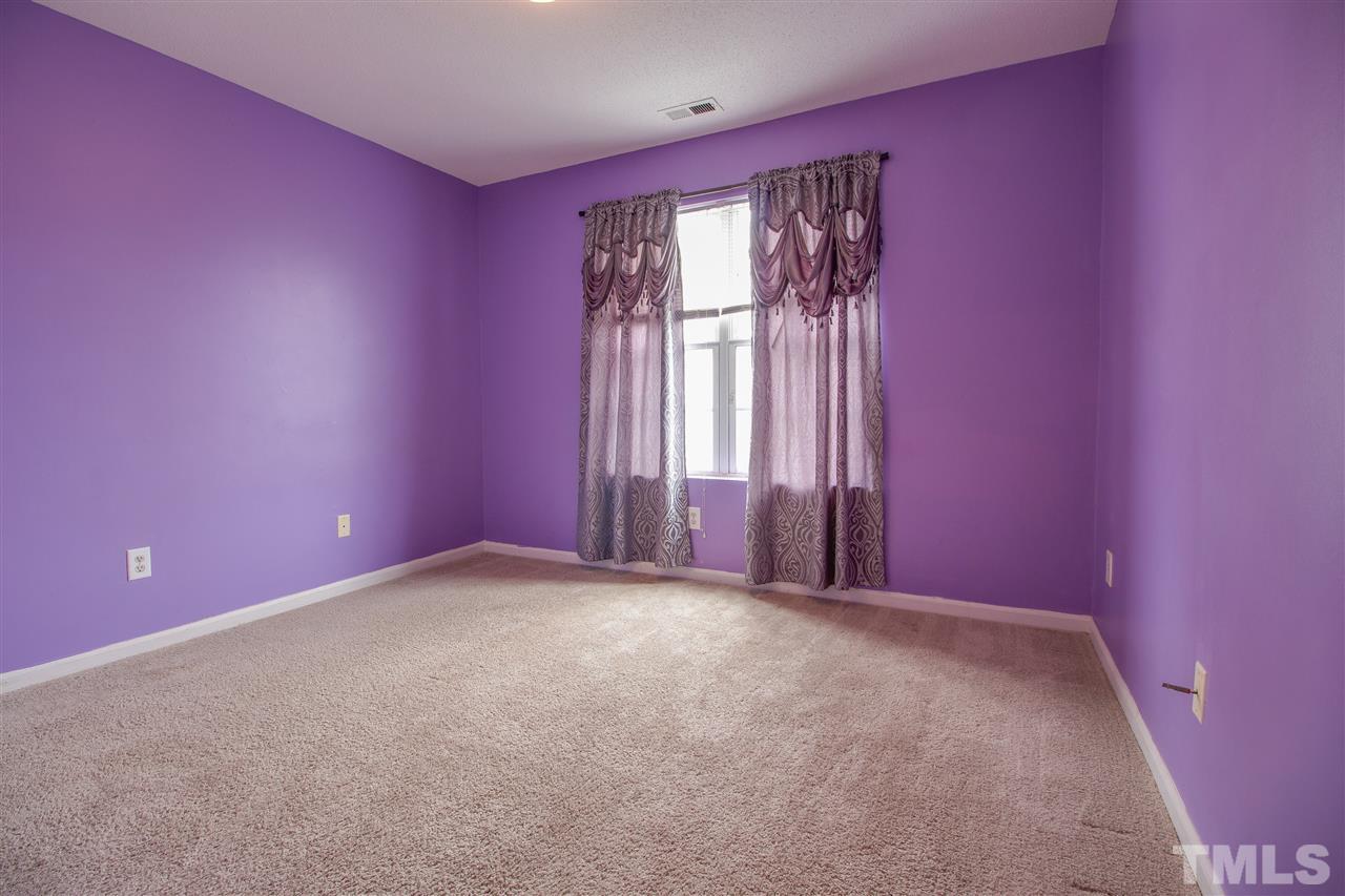 2905 Oneida Court Raleigh, NC 27610 - Photo 15 of 21 wooden floor and windows in a room