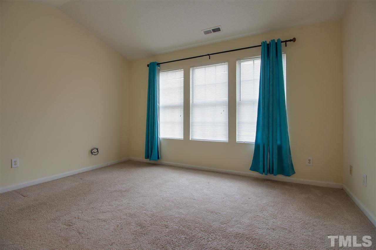 2905 Oneida Court Raleigh, NC 27610 - Photo 10 of 21 a view of an empty room with a window