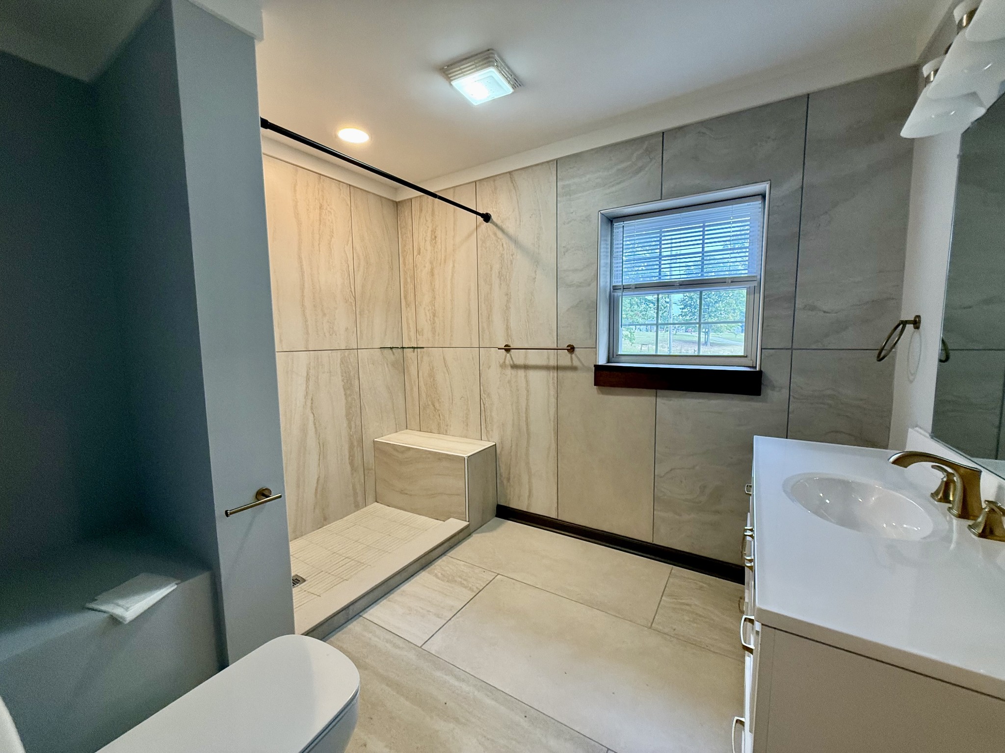 9388 Harrison Ferry Road McMinnville, TN 37110 - Photo 12 of 50 a bathroom with a sink toilet and shower