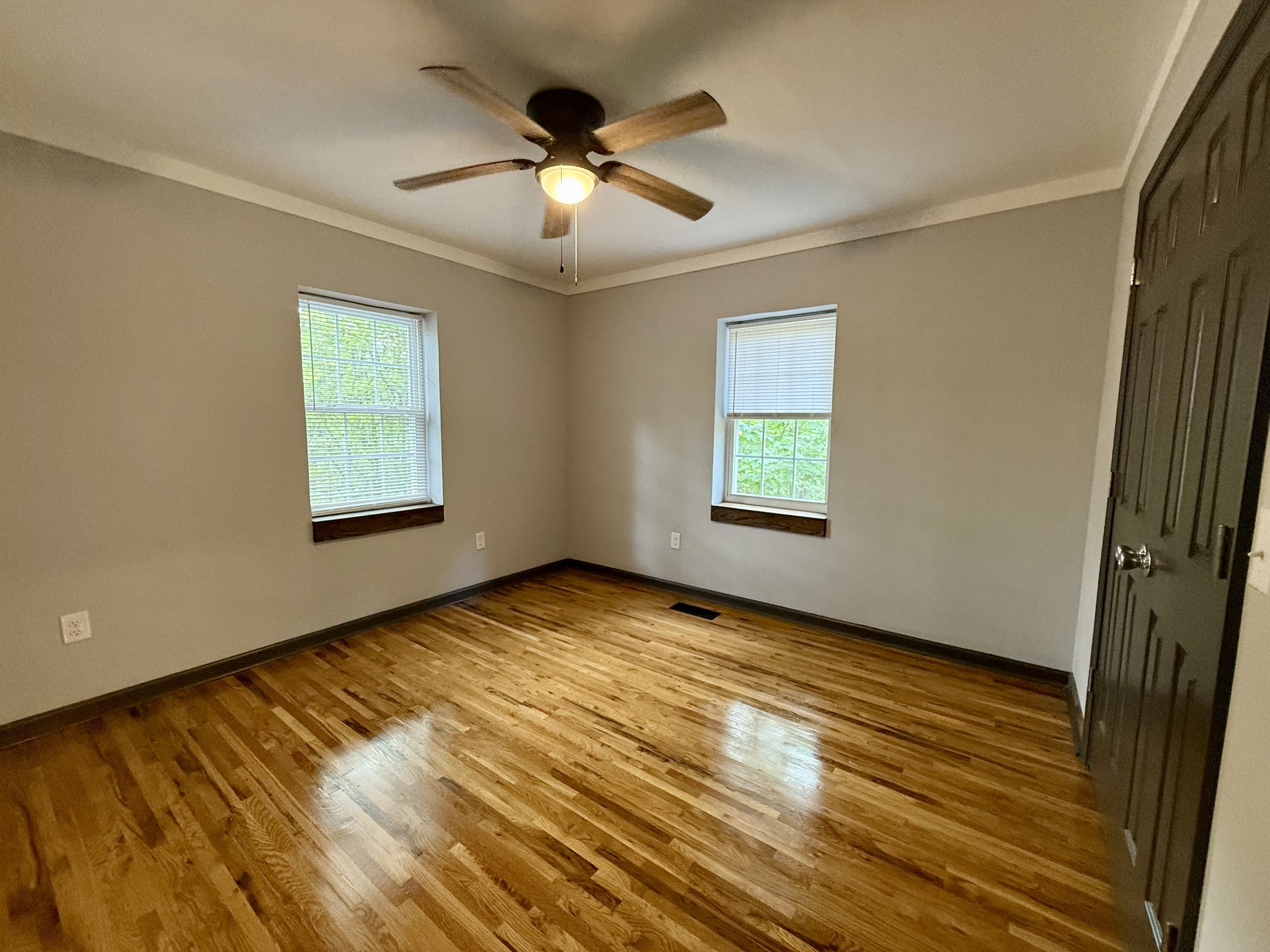 9388 Harrison Ferry Road McMinnville, TN 37110 - Photo 15 of 50 wooden floor in an empty room with a window
