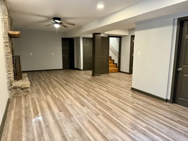 a view of a livingroom with wooden floor