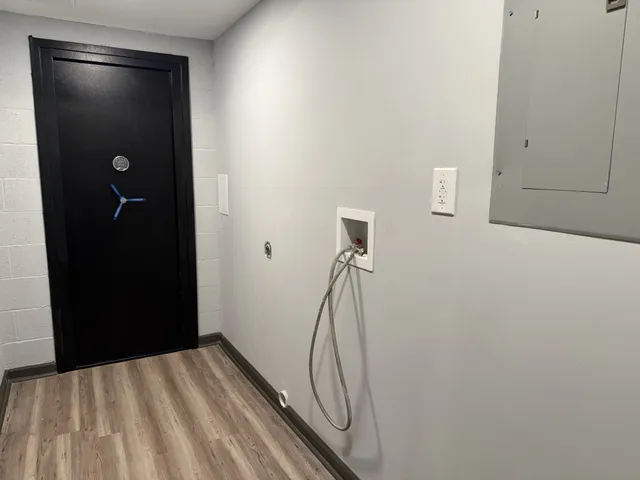 a view of a livingroom and a hallway