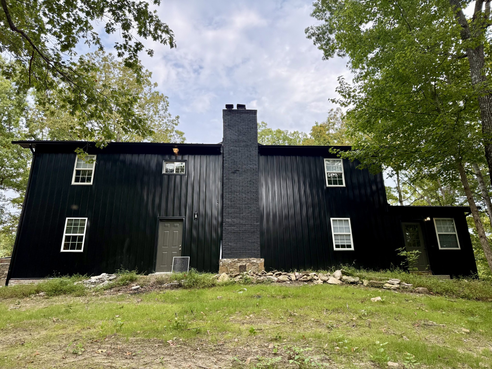 9388 Harrison Ferry Road McMinnville, TN 37110 - Photo 41 of 50 a front view of a house with a yard