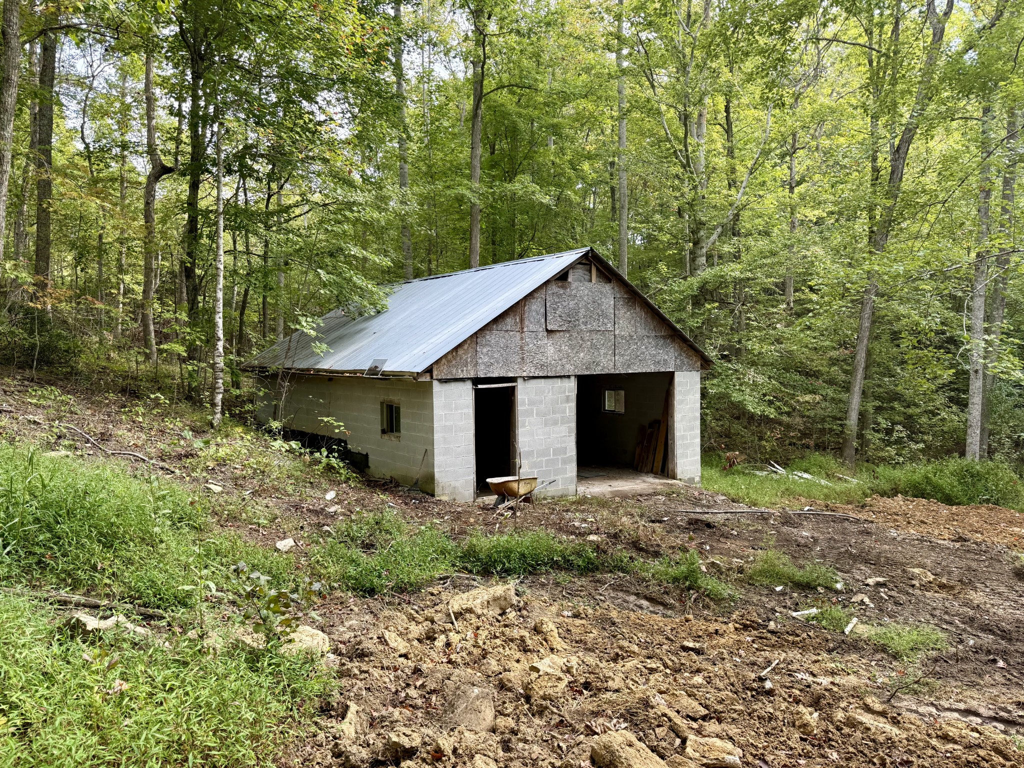 9388 Harrison Ferry Road McMinnville, TN 37110 - Photo 44 of 50 a front view of a house with garden