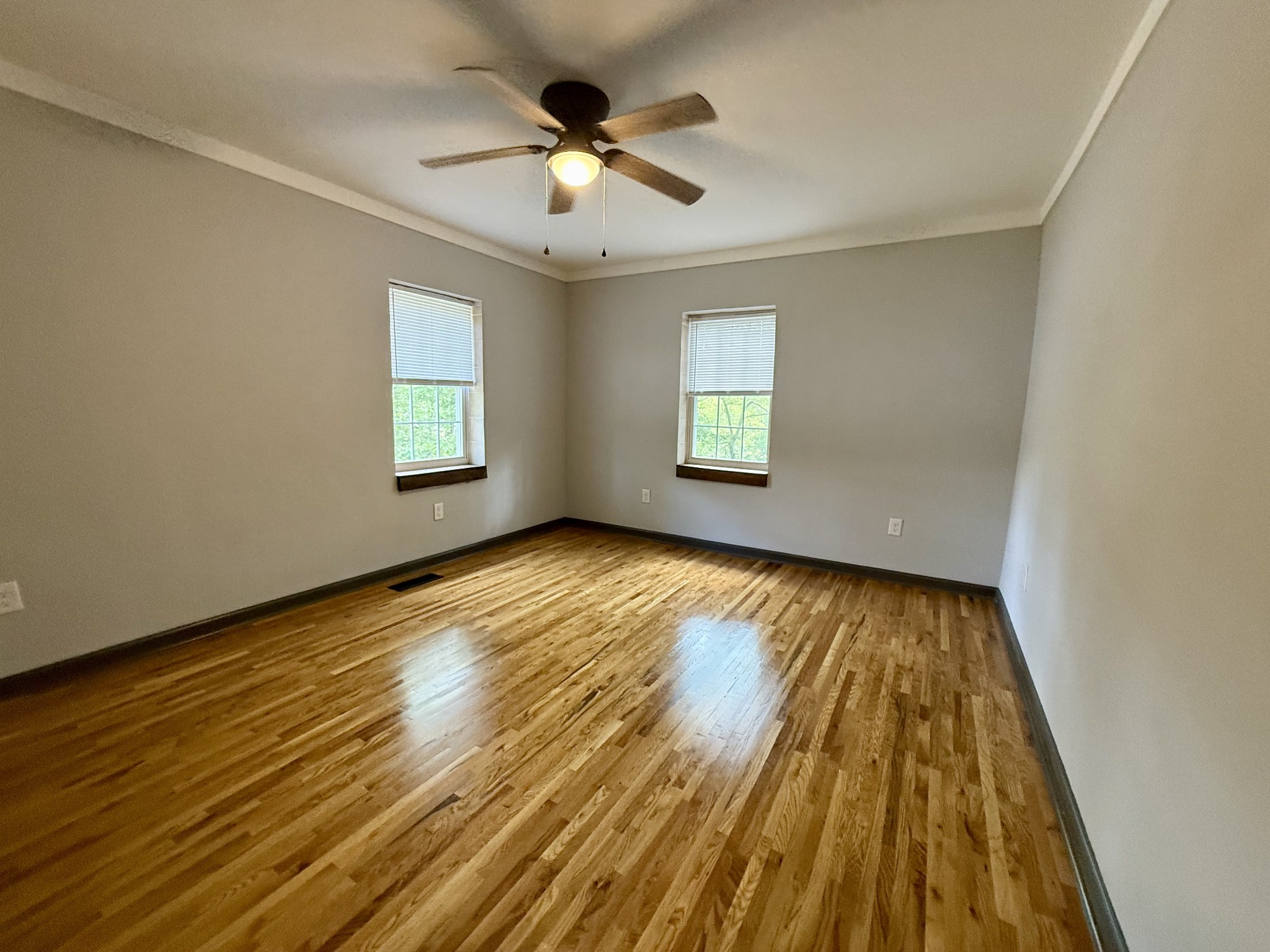 9388 Harrison Ferry Road McMinnville, TN 37110 - Photo 9 of 50 wooden floor in an empty room with a window