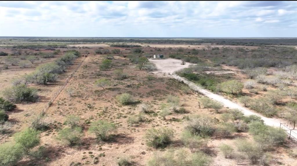 69 Energy Road San Isidro, TX 78588 - Photo 11 of 12 Aerial view featuring a rural view