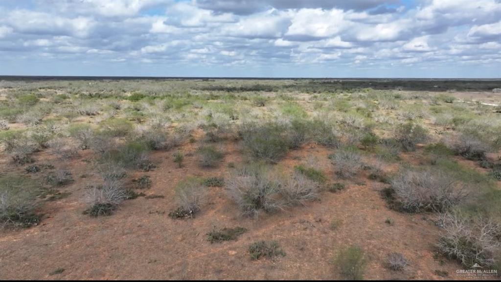 69 Energy Road San Isidro, TX 78588 - Photo 12 of 12 View of landscape featuring a rural view