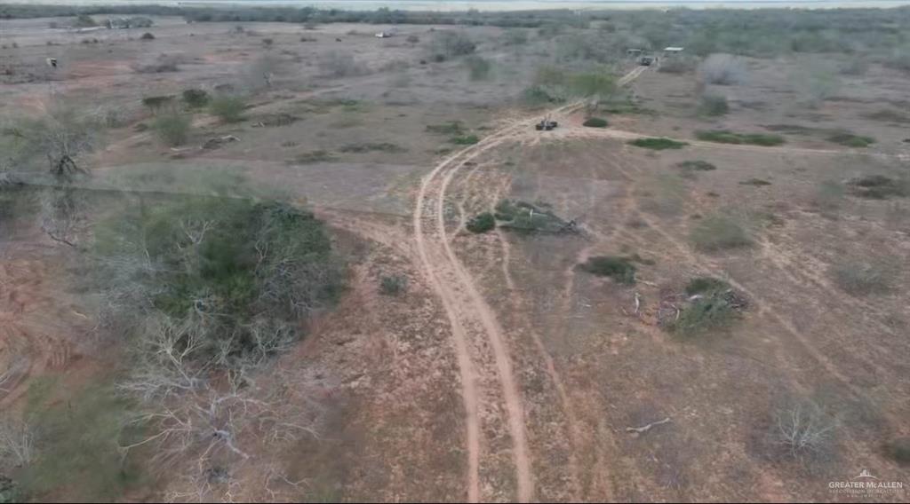 69 Energy Road San Isidro, TX 78588 - Photo 8 of 12 Drone / aerial view featuring a rural view
