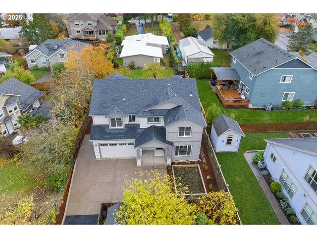 an aerial view of a houses with outdoor space