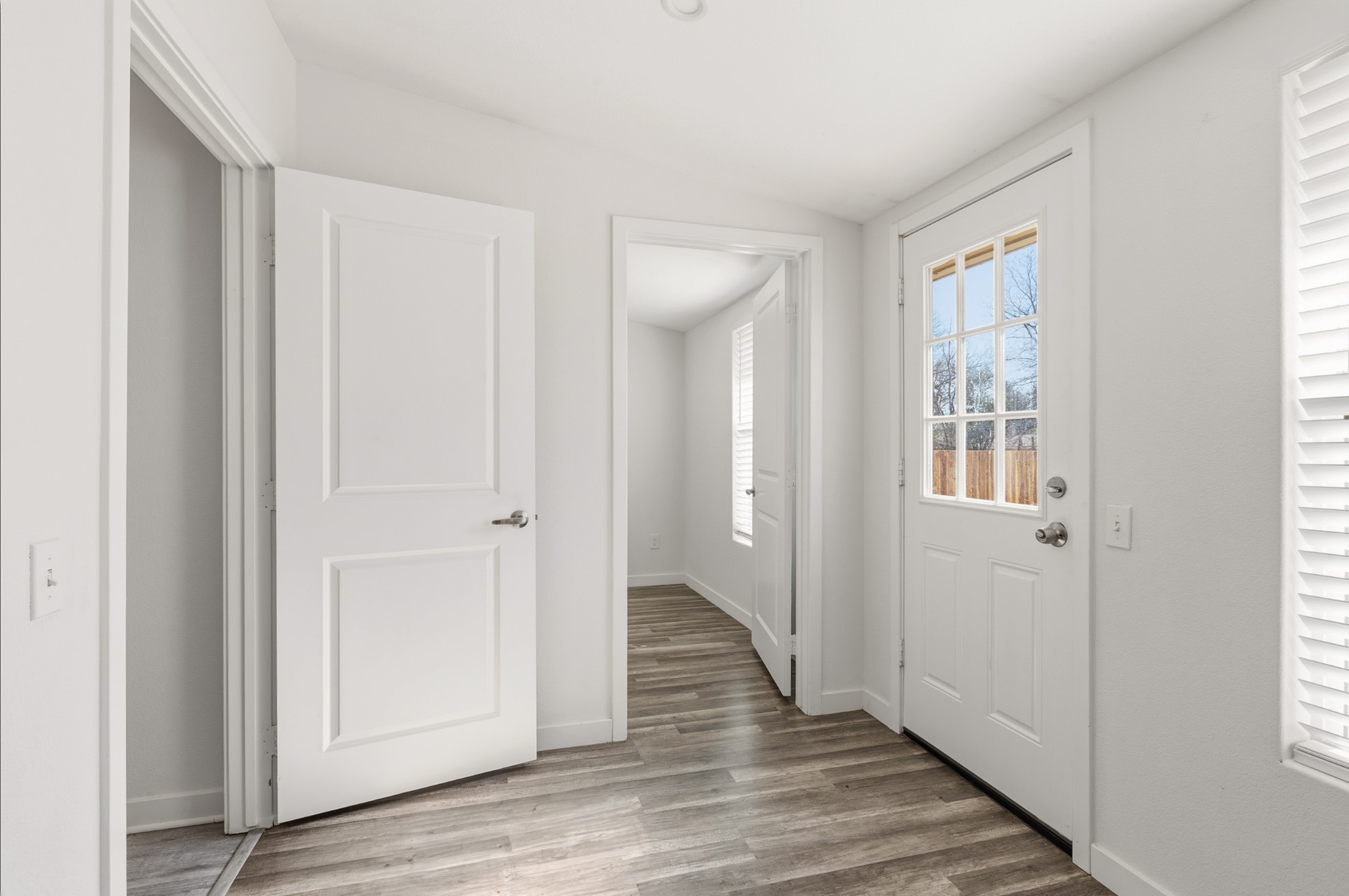 108 Irene Street Elgin, TX 78621 - Photo 21 of 29 Entryway featuring light wood-style floors and lofted ceiling
