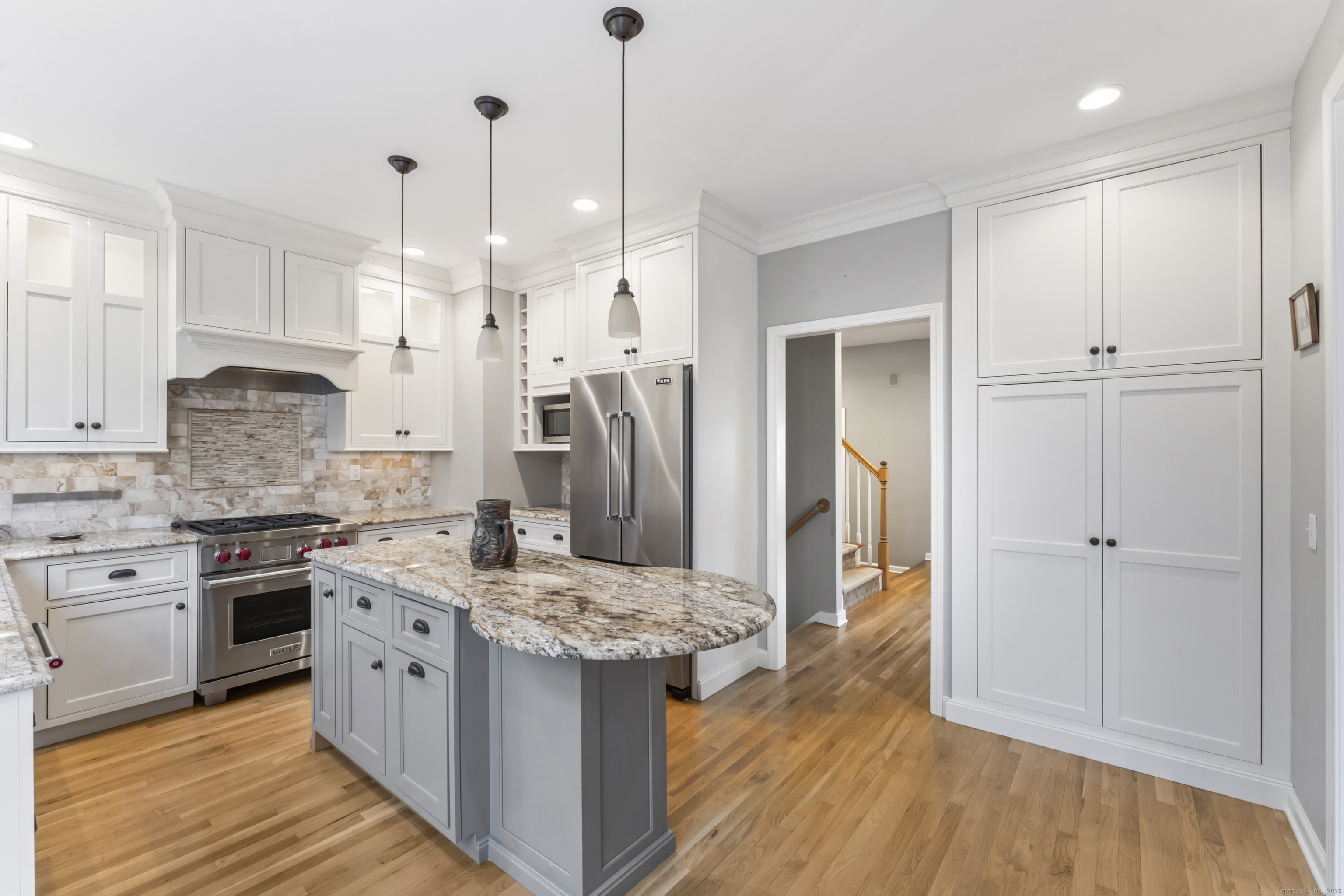 4 Woods Way New Fairfield, CT 06812 - Photo 13 of 39 a kitchen with stainless steel appliances granite countertop a stove and a sink