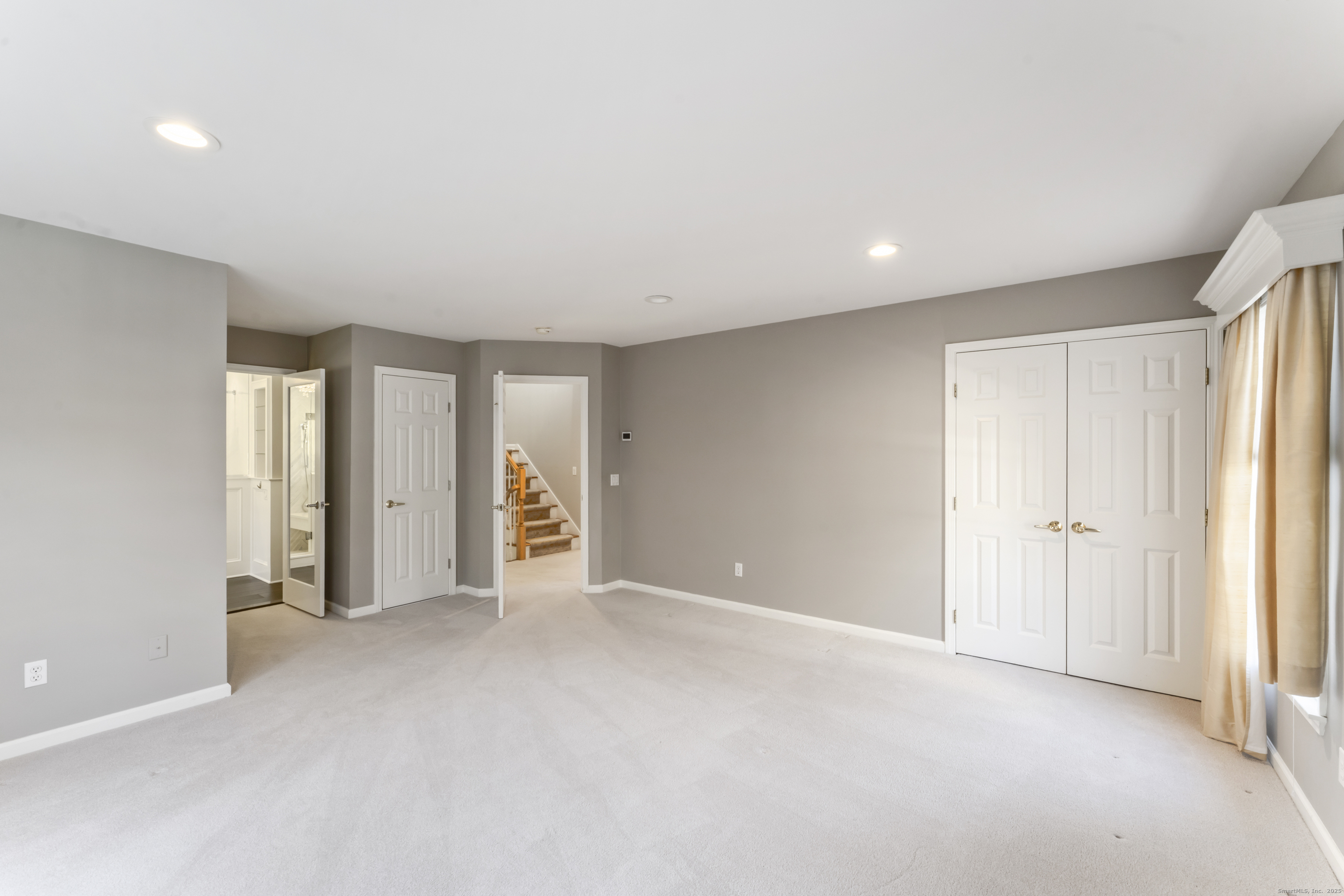 4 Woods Way New Fairfield, CT 06812 - Photo 19 of 39 a view of an empty room with closet and a window