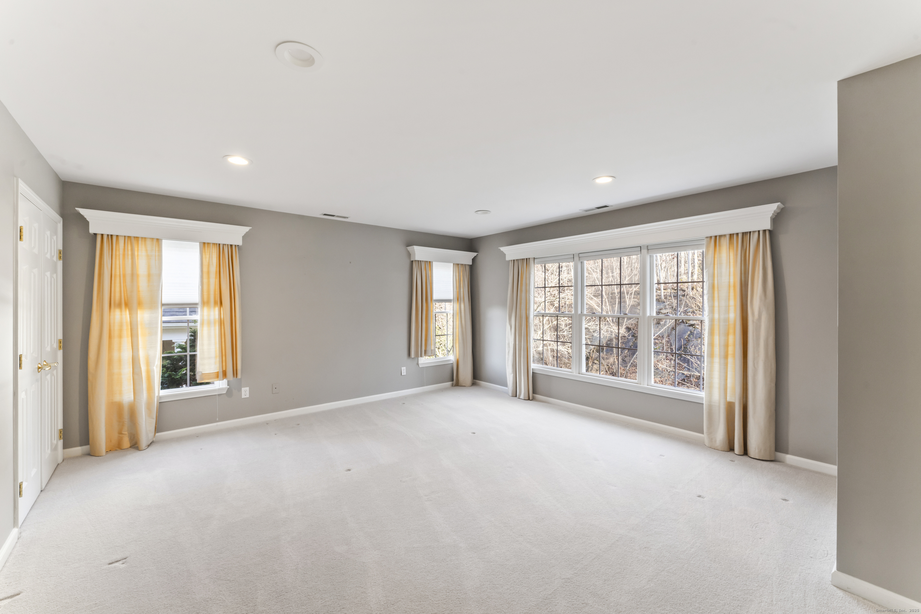 4 Woods Way New Fairfield, CT 06812 - Photo 20 of 39 a view of an empty room with a window