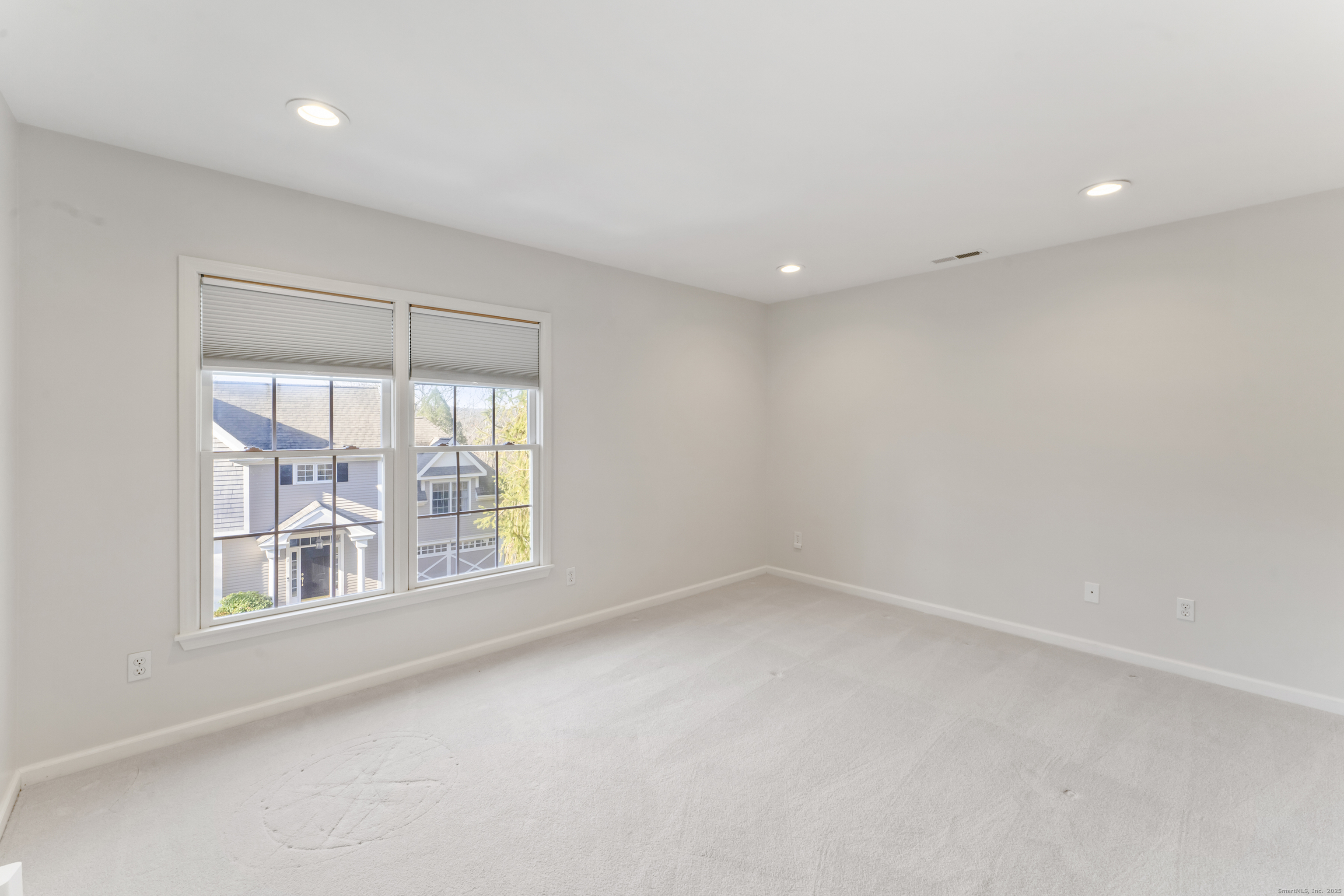 4 Woods Way New Fairfield, CT 06812 - Photo 25 of 39 an empty room with a window