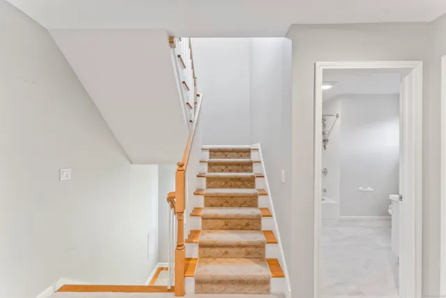 a view of staircase with white walls and white walls