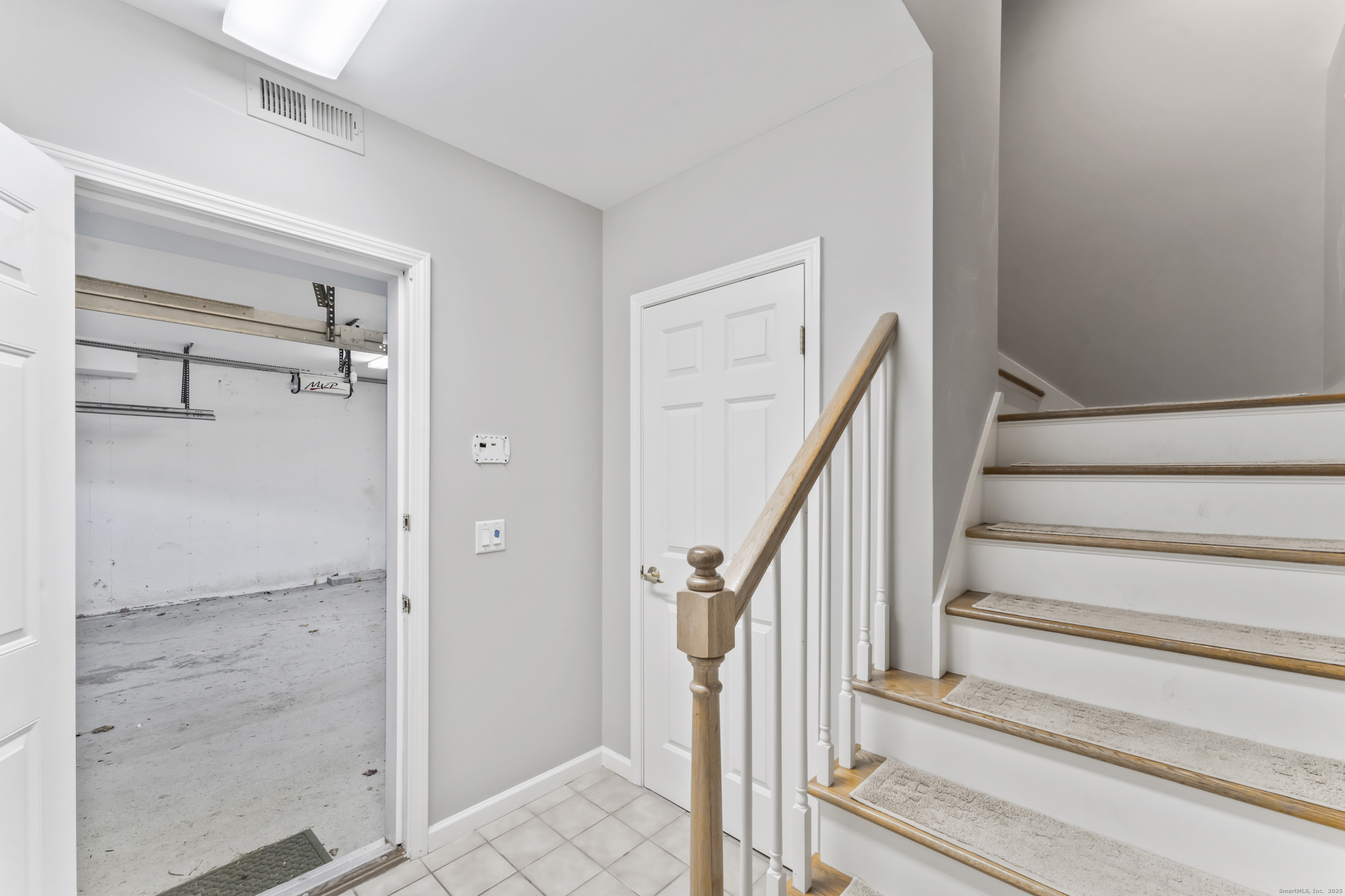 4 Woods Way New Fairfield, CT 06812 - Photo 33 of 39 a view of staircase with white walls and railing