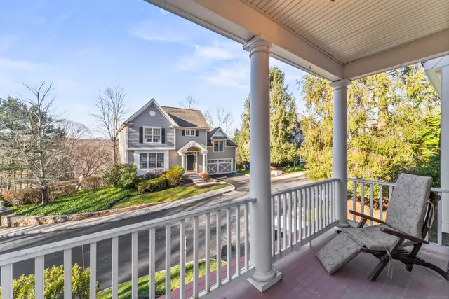 a view of a street from a balcony
