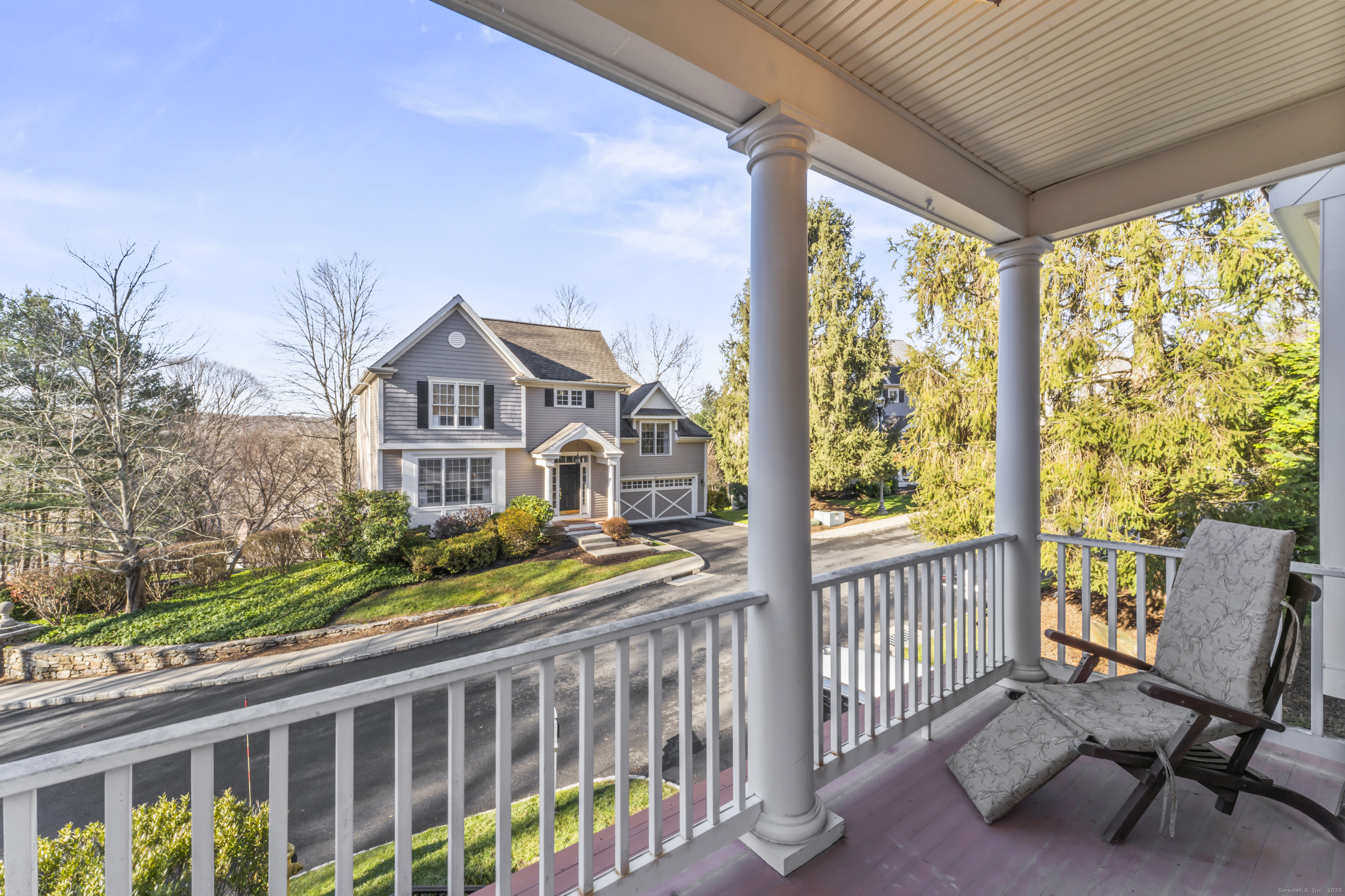 4 Woods Way New Fairfield, CT 06812 - Photo 34 of 39 a view of a street from a balcony