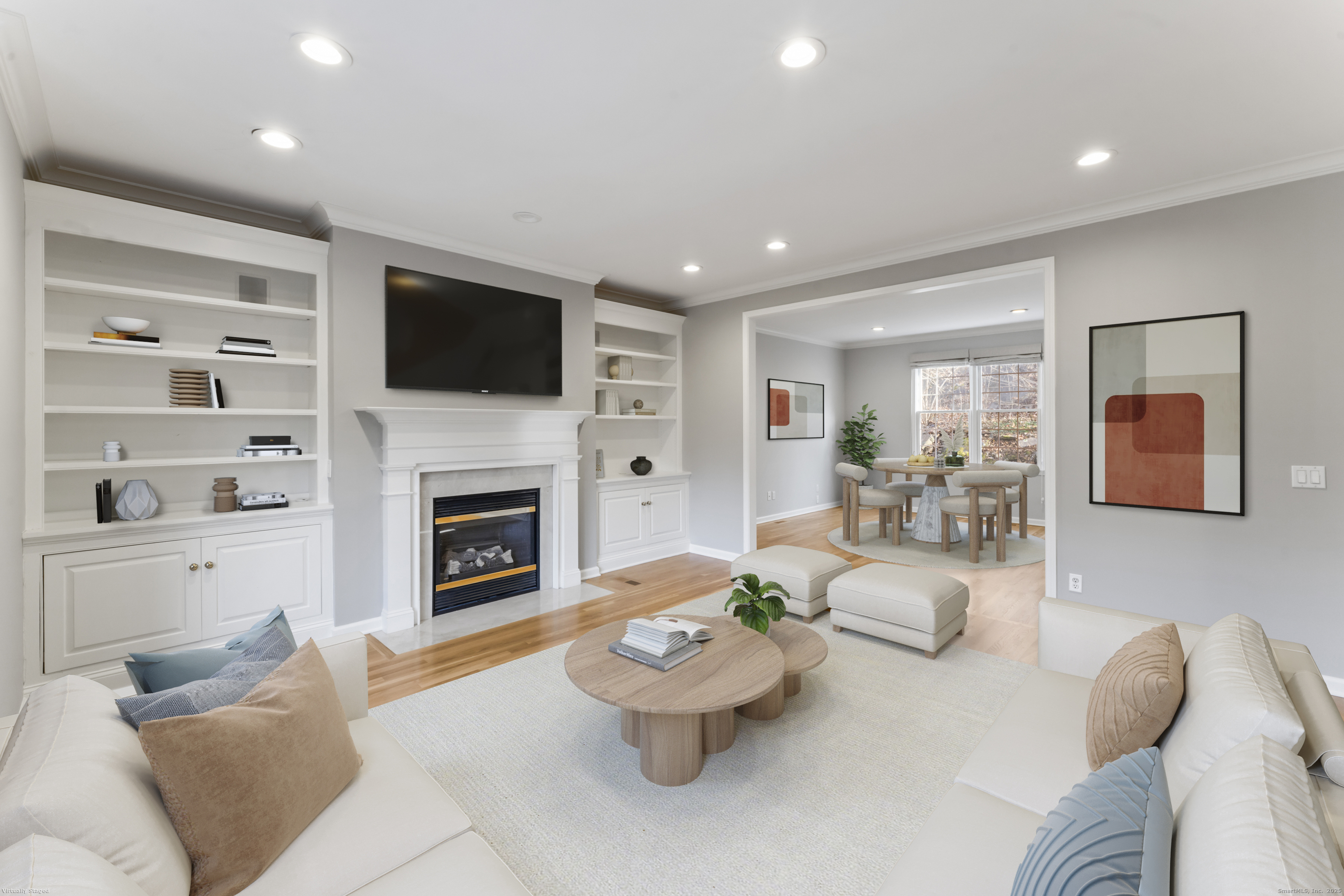 4 Woods Way New Fairfield, CT 06812 - Photo 5 of 39 a living room with furniture a flat screen tv and a fireplace
