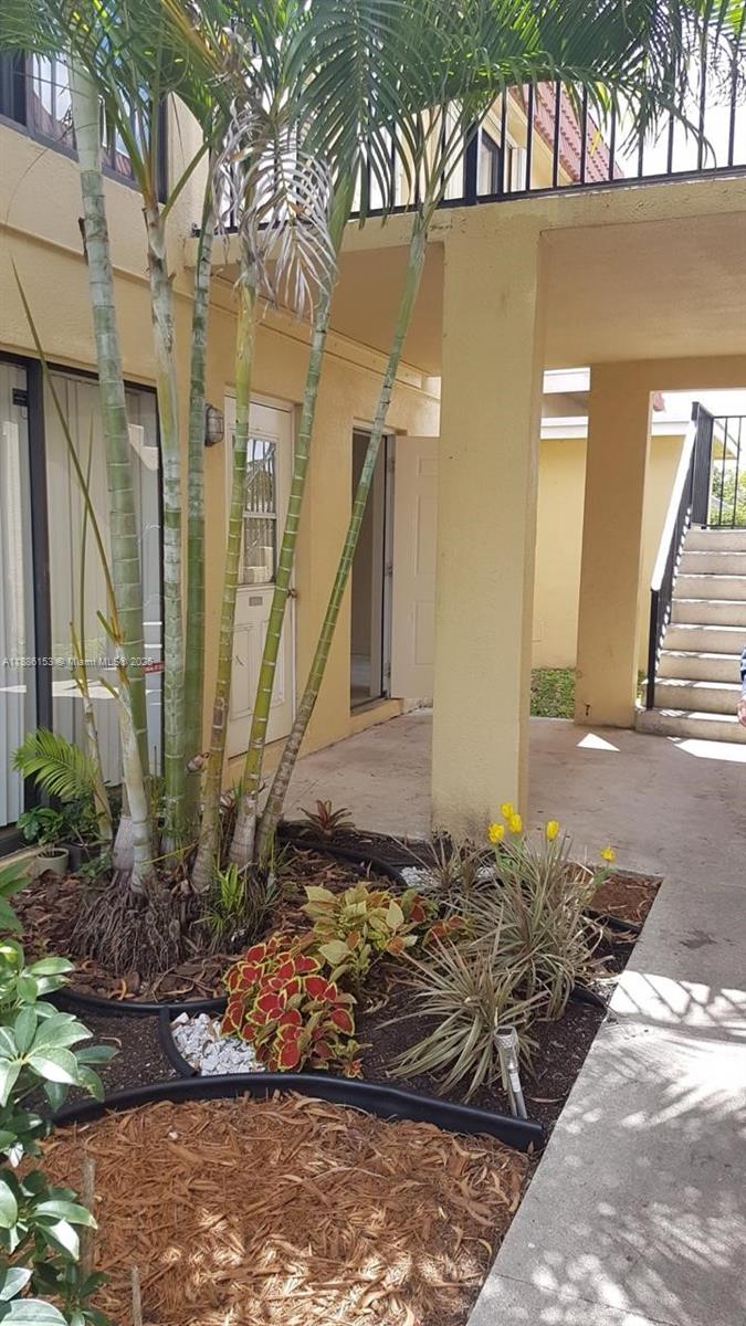 11386 Royal Palm Boulevard, Unit 11386 Coral Springs, FL 33065 - Photo 1 of 10 a view of a entryway of the house