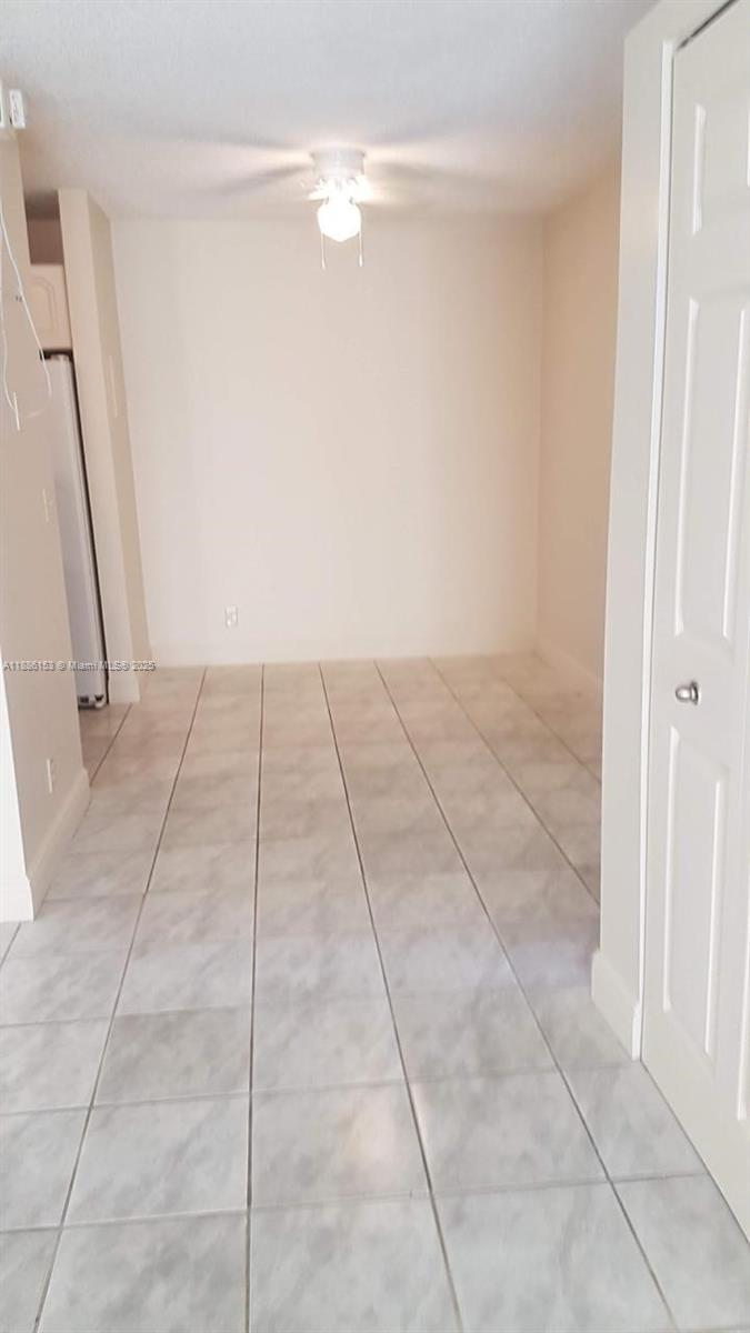 11386 Royal Palm Boulevard, Unit 11386 Coral Springs, FL 33065 - Photo 10 of 10 a view of an empty room