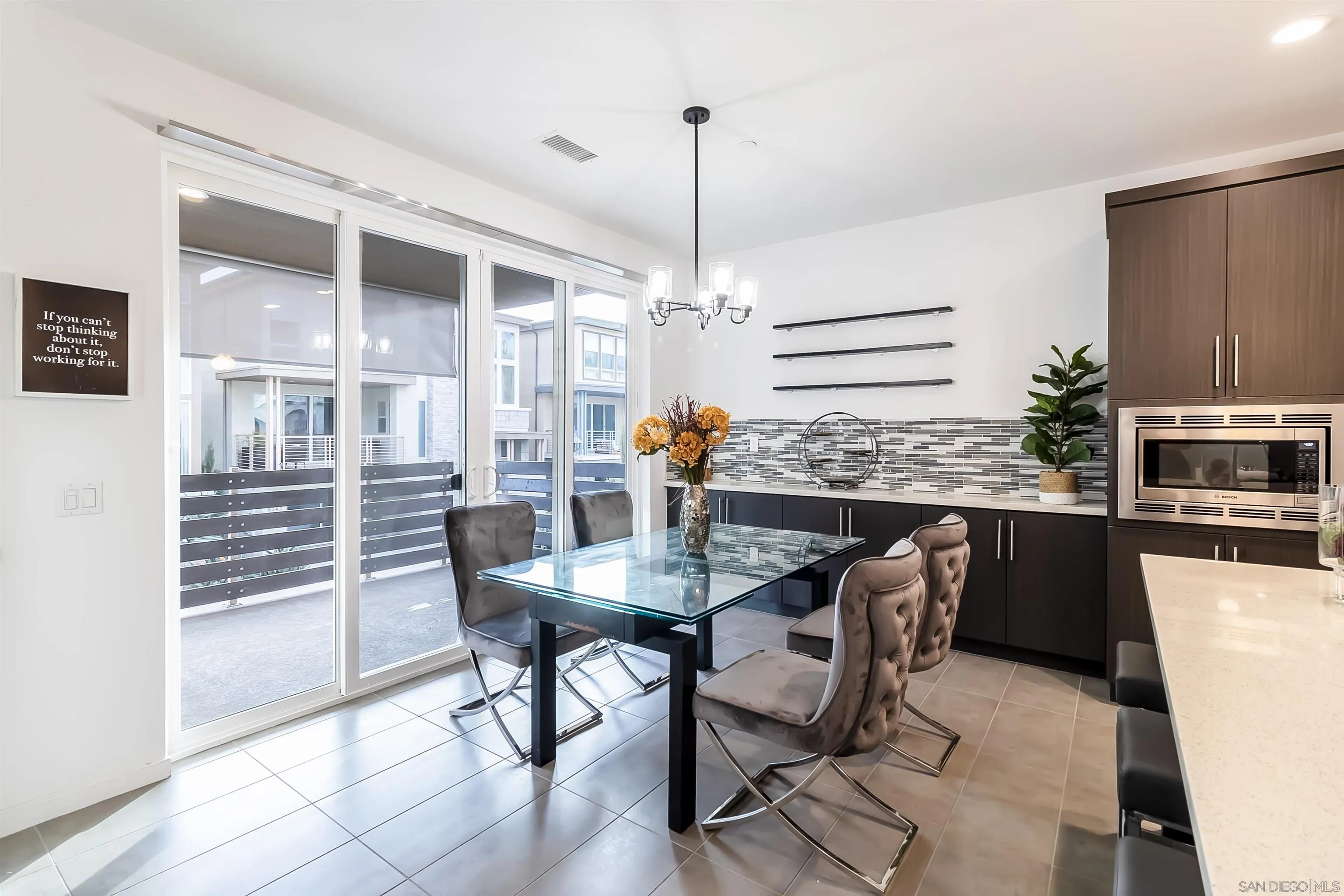 8344 Summit Way San Diego, CA 92108 - Photo 11 of 41 a view of a dining room with furniture and wooden floor