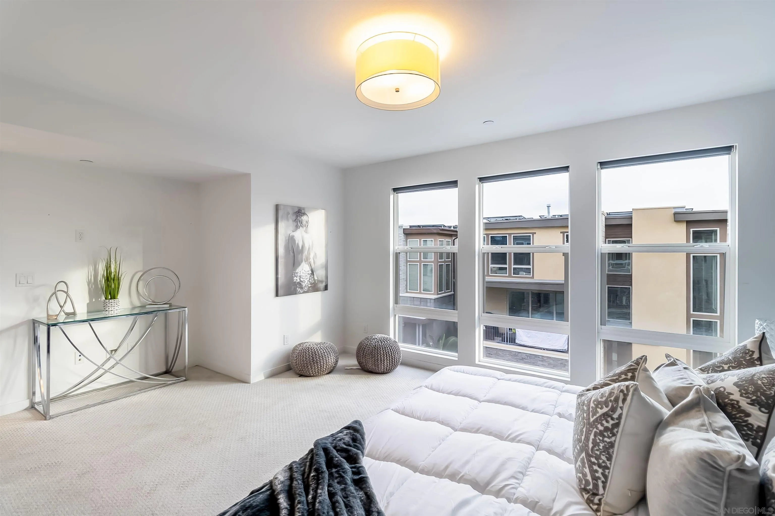 8344 Summit Way San Diego, CA 92108 - Photo 16 of 41 a bedroom with furniture and a large window