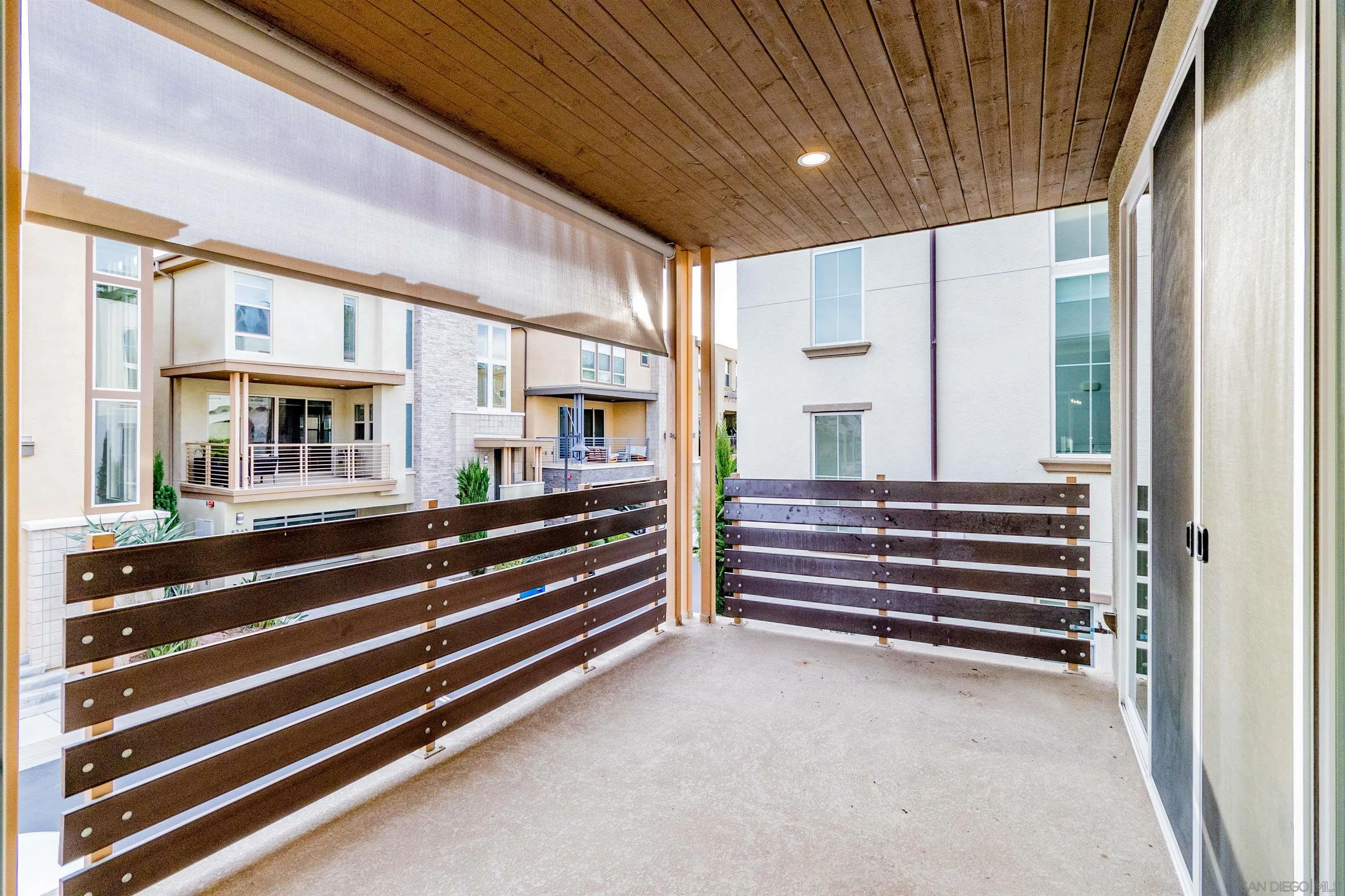 8344 Summit Way San Diego, CA 92108 - Photo 22 of 41 a view of room with window and wooden floor