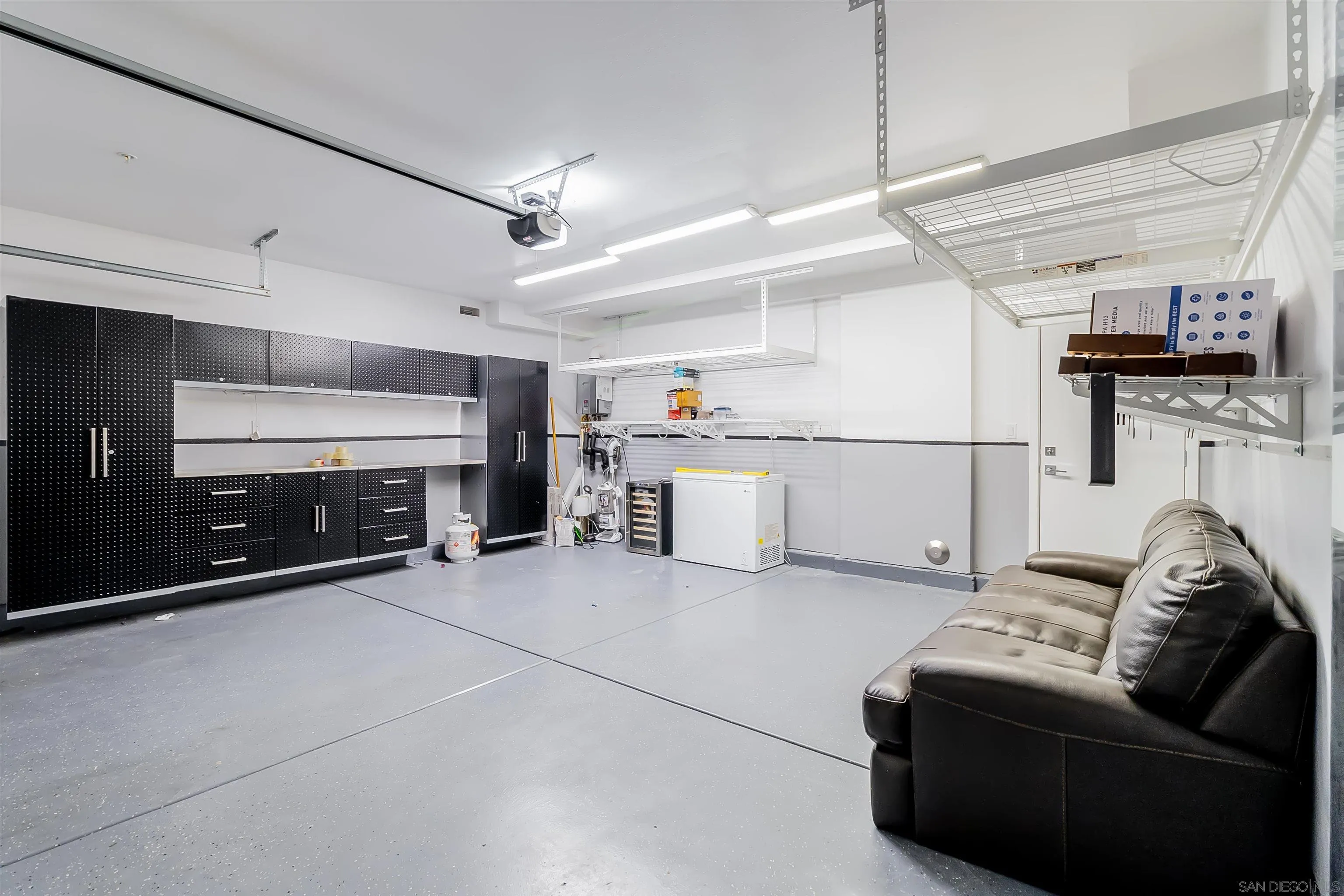 8344 Summit Way San Diego, CA 92108 - Photo 26 of 41 a living room with furniture and a fireplace