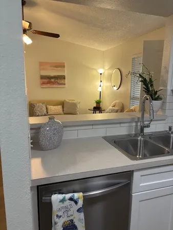 a closeup of a sink and a mirror