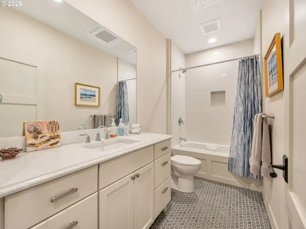 a view of a storage & utility room with washer and dryer