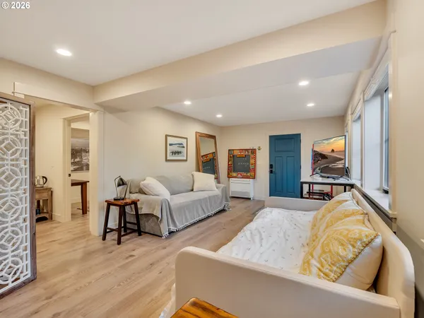 a bedroom with a bed and a dresser