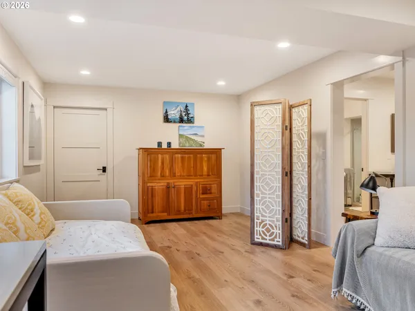 a living room with furniture and a table