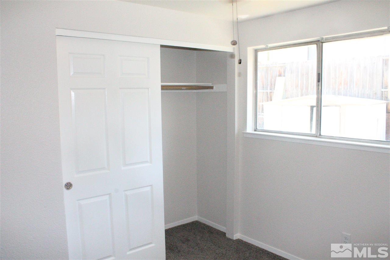 6630 Lotus Street Reno, NV 89506 - Photo 17 of 21 a view of an empty room with a window