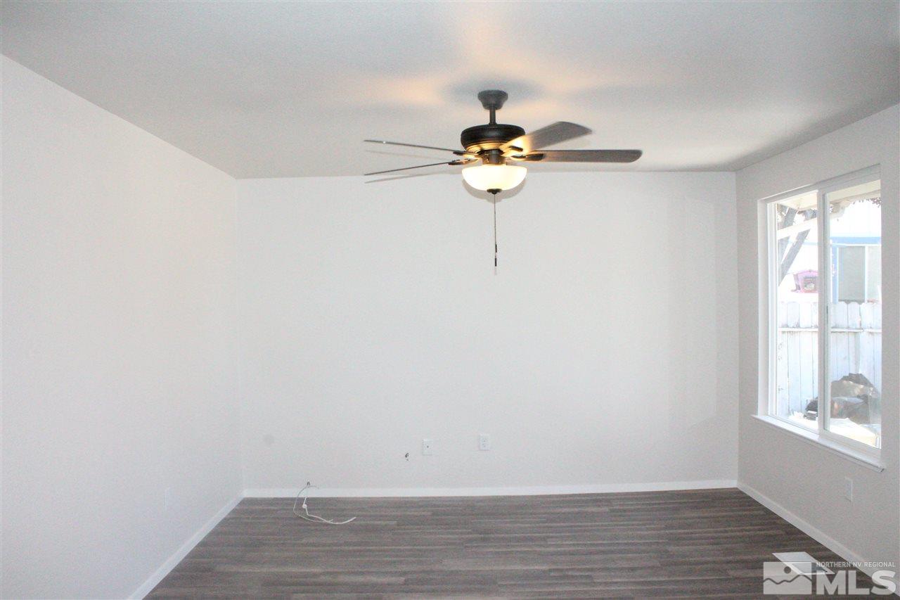 6630 Lotus Street Reno, NV 89506 - Photo 3 of 21 a view of an empty room with a window