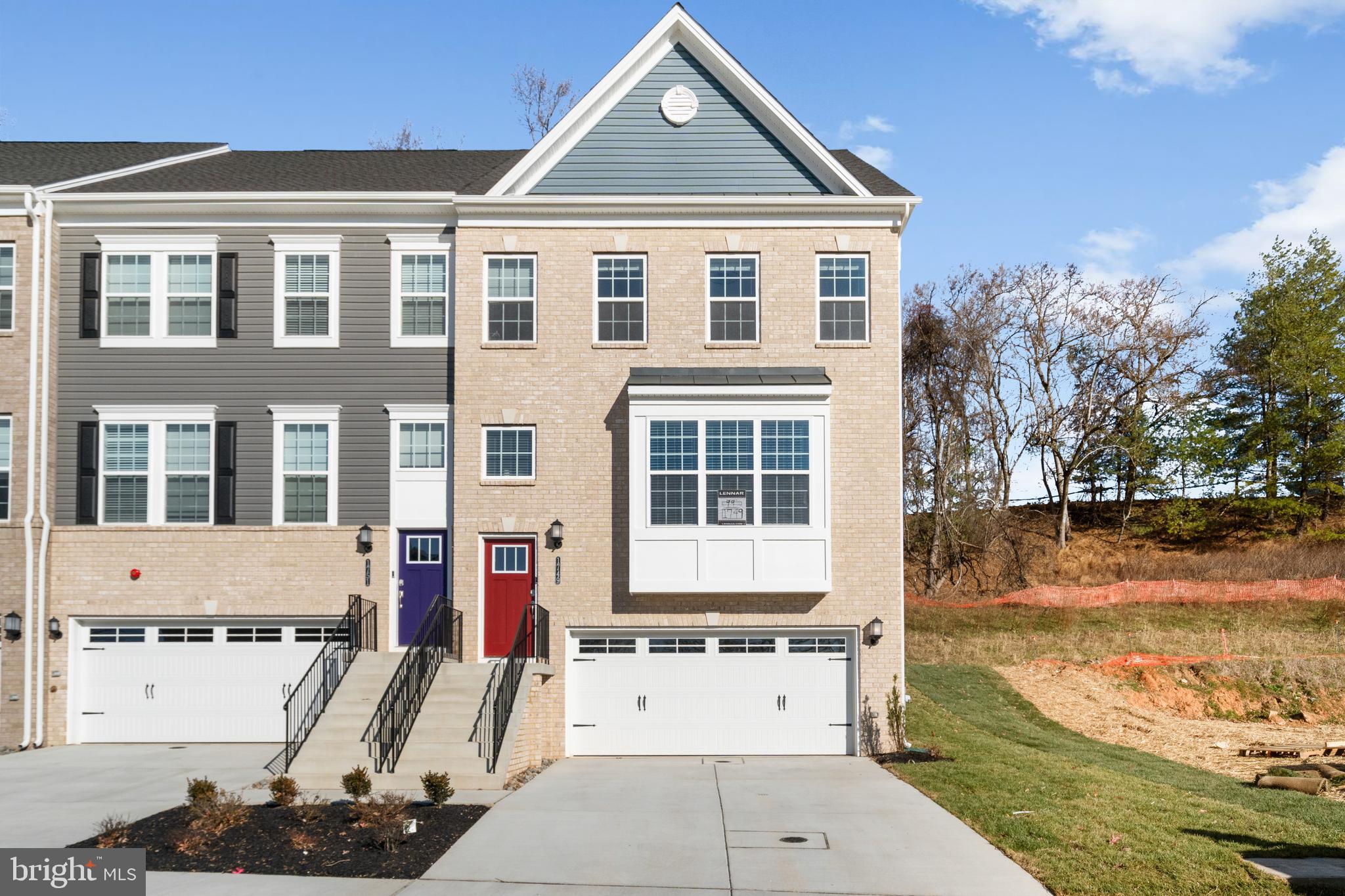 1749 Water Xing Road Baltimore, MD 21208 - Photo 1 of 2 a front view of a house with a yard