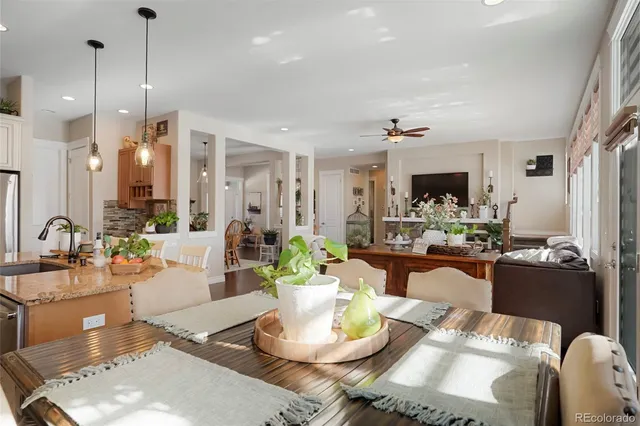 a view of a dining room with furniture window and outdoor view