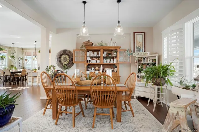 a bedroom with a bed dresser and a window