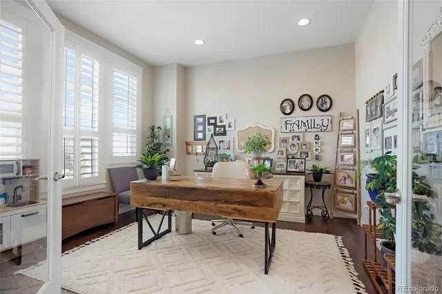 a view of a workspace with furniture