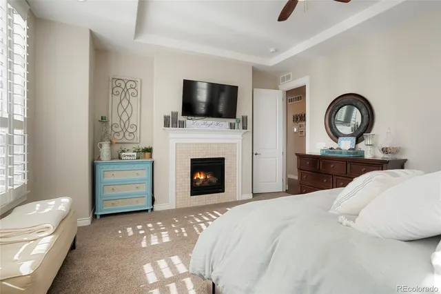 a bathroom with a toilet a sink and a mirror