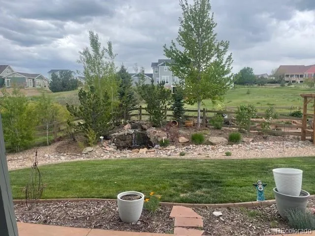 a view of a lake with a building in the background