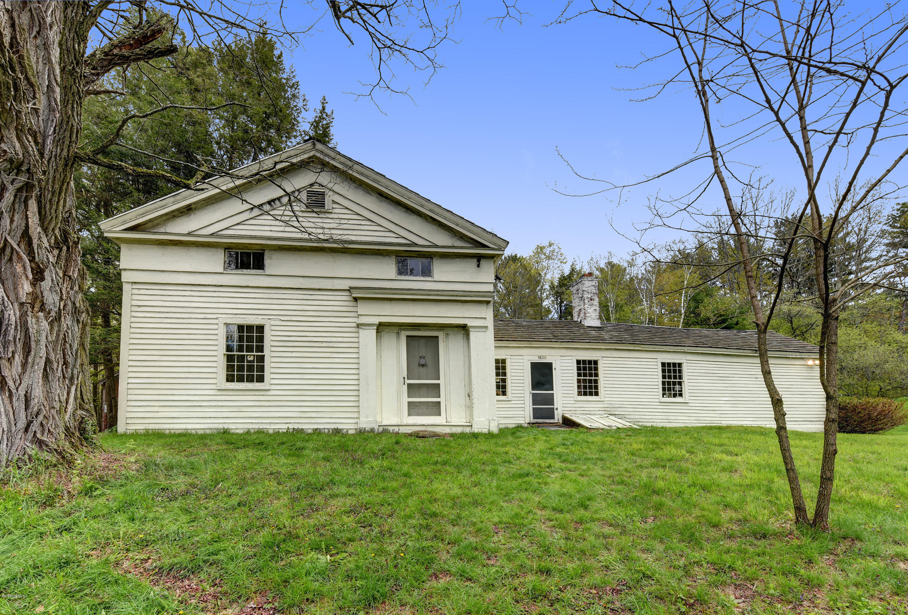82 Hammertown Road Sandisfield, MA 01255 - Photo 1 of 49 a front view of a house with garden