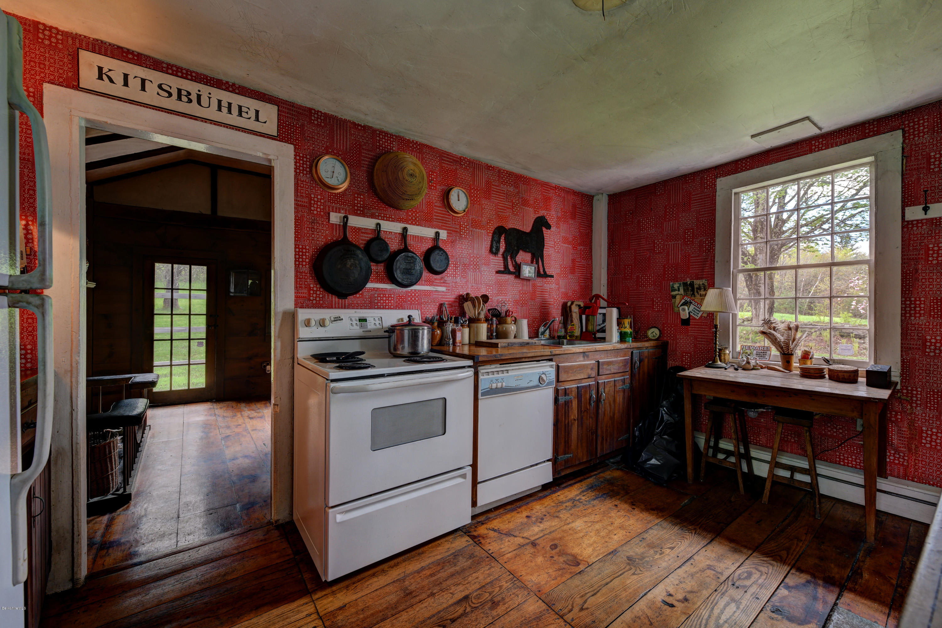 82 Hammertown Road Sandisfield, MA 01255 - Photo 11 of 49 a kitchen with stainless steel appliances granite countertop a stove and a refrigerator