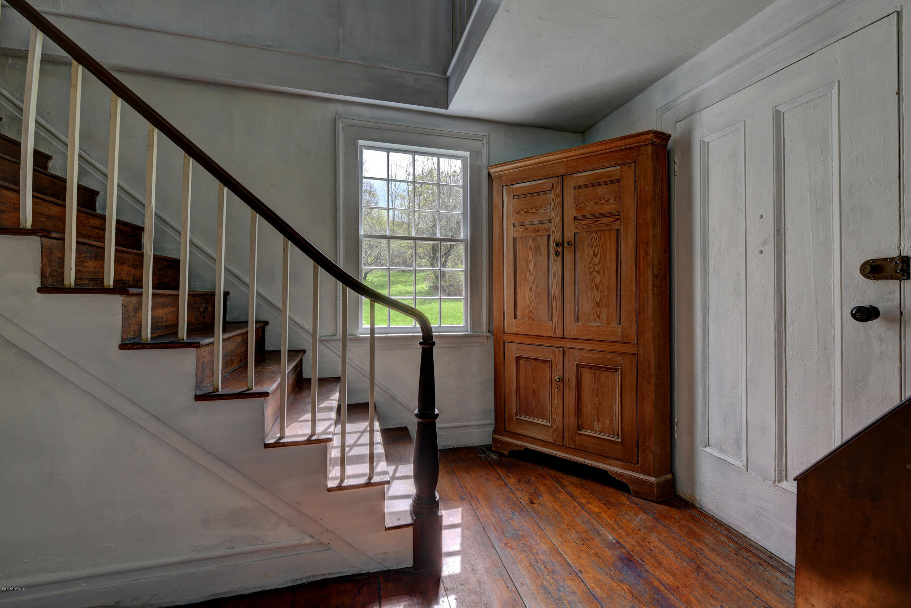 82 Hammertown Road Sandisfield, MA 01255 - Photo 3 of 49 a view of front door with wooden floor and stairs