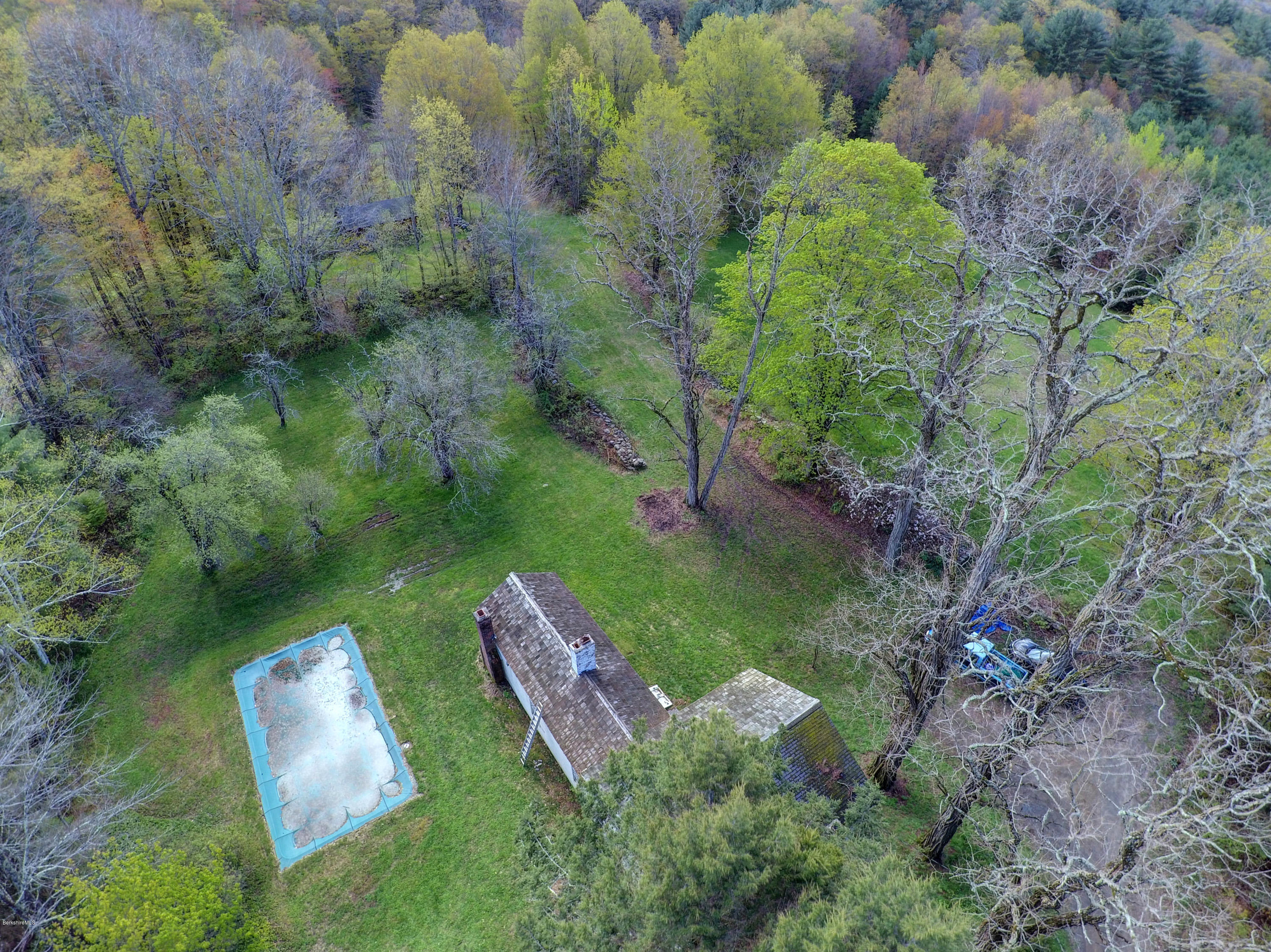 82 Hammertown Road Sandisfield, MA 01255 - Photo 21 of 49 an aerial view of a house with a yard and lake